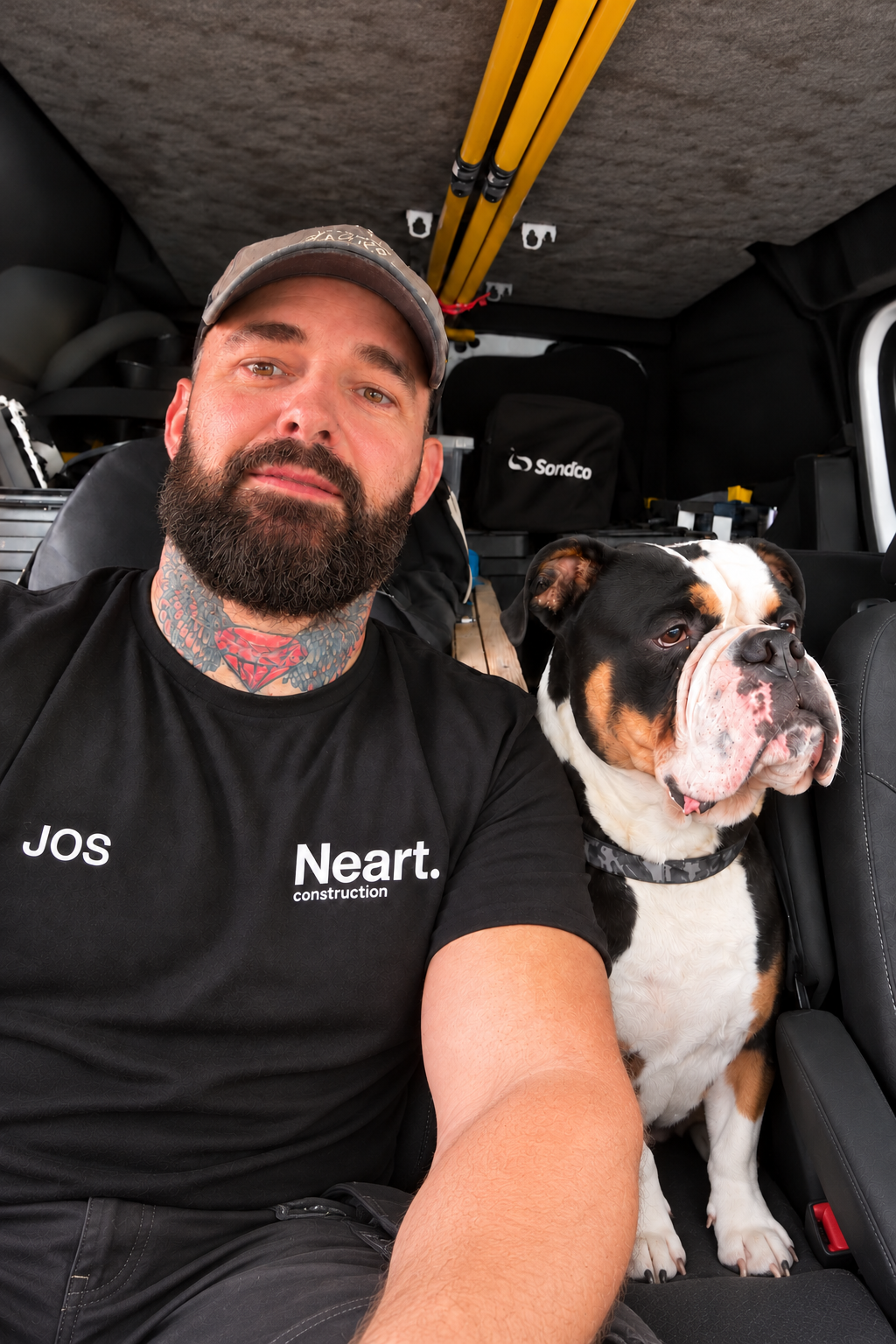 Jos, Team Management at Neart Construction, with his dog